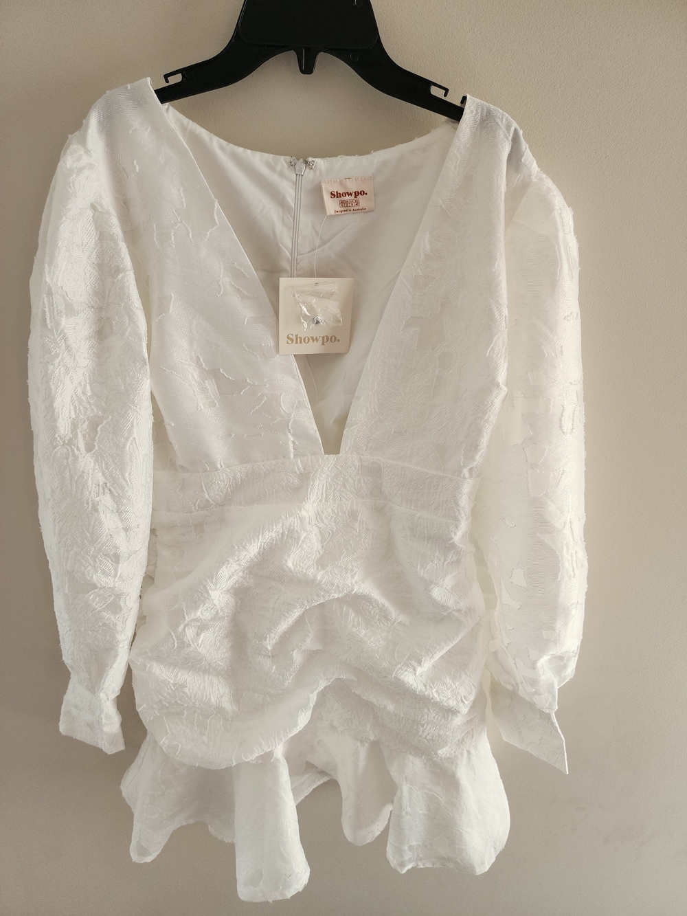 Showpo White Textured Deep V Ruffle Mini Dress